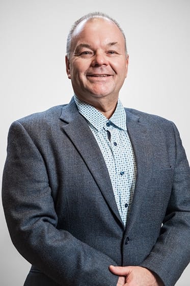 Headshot of VSC employee Tom B.